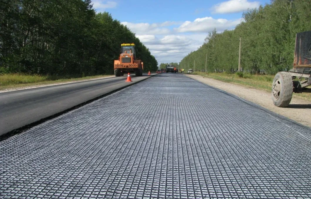 Geogrid biassiale composito in fibra di vetro con geotessile non tessuto per rinforzo del suolo/materiale da costruzione stradale Geocompos 9