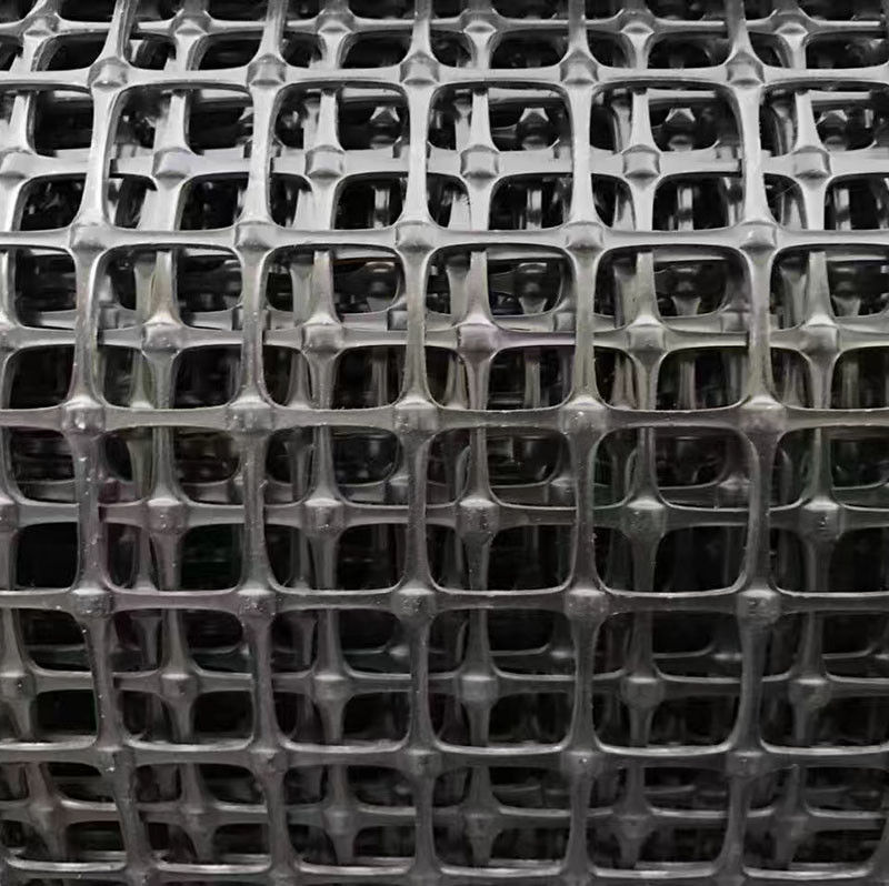 Geogrid biassiale di plastica per rinforzo del suolo, PP/PET ad alta resistenza alla trazione, Balck 30kN/m, rete di stabilizzazione della base stradale
