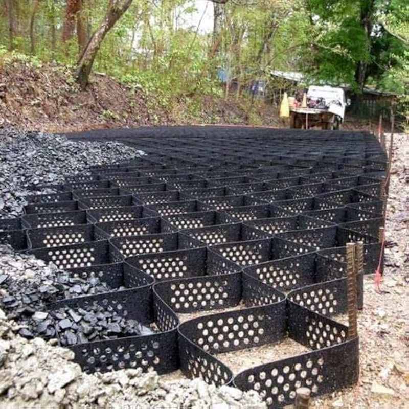 Geogriglia in HDPE con fori, sistema di confinamento cellulare ad alta resistenza, geogriglia a nido d'ape in HDPE per fondazioni stradali, protezione pendii, parcheggi, vialetti, muri di contenimento
