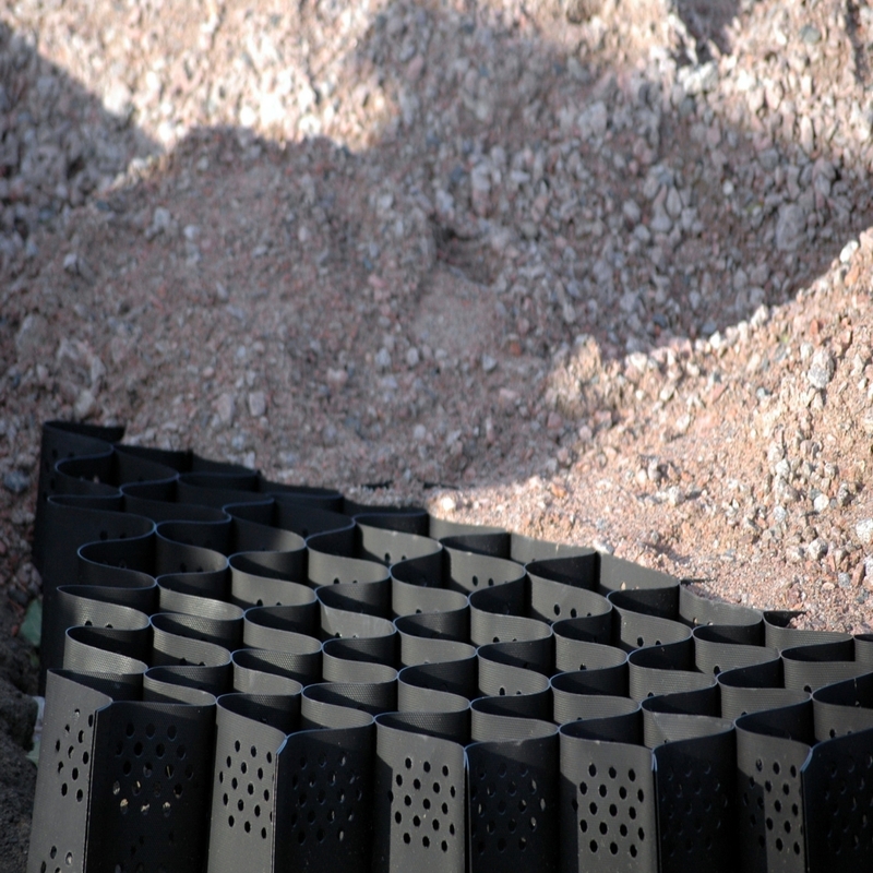 Geogriglia in HDPE con fori, sistema di confinamento cellulare ad alta resistenza, geogriglia a nido d'ape in HDPE per fondazioni stradali, protezione pendii, parcheggi, vialetti, muri di contenimento